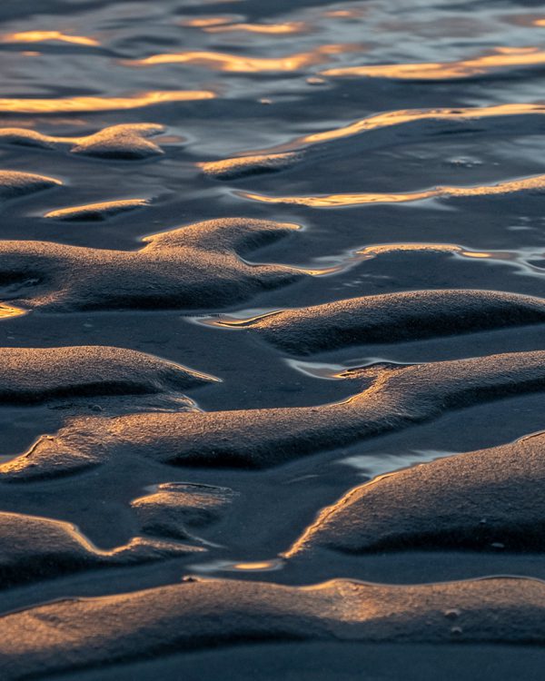 Masja strand bij zonsondergang